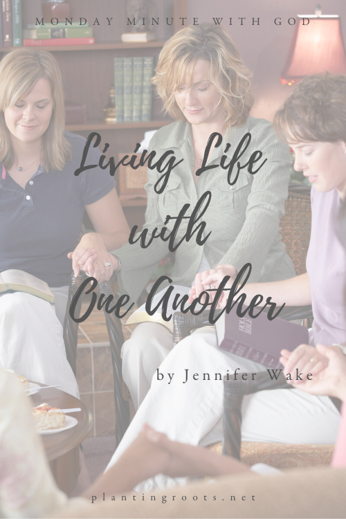 women praying and living life together