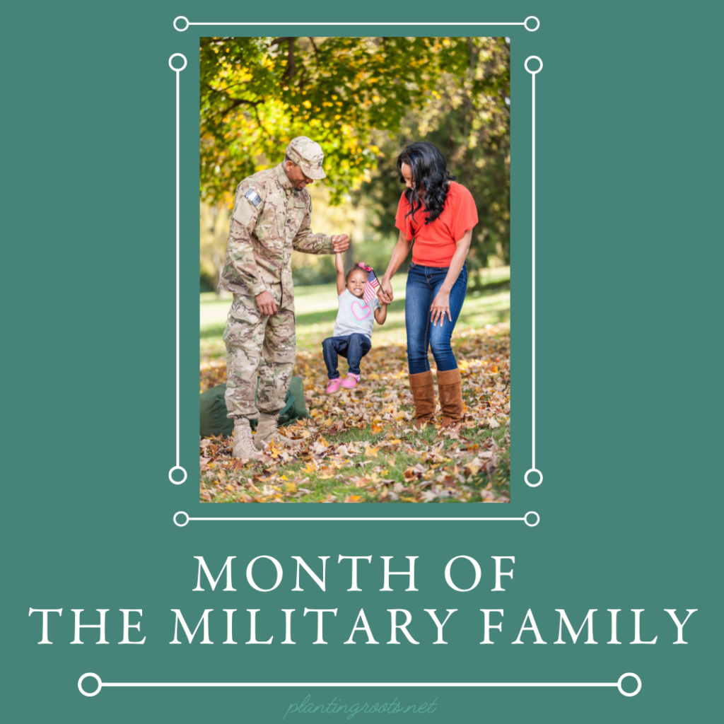 Image of a military dad and a mom playing with thier daughter in leaves